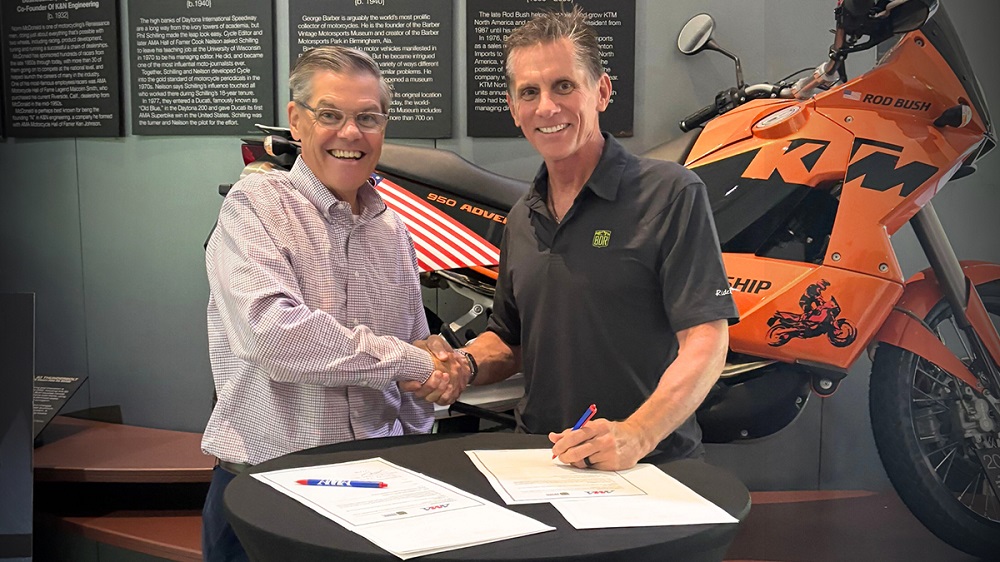 Dingman and James standing together for the AMA–BDR MOU