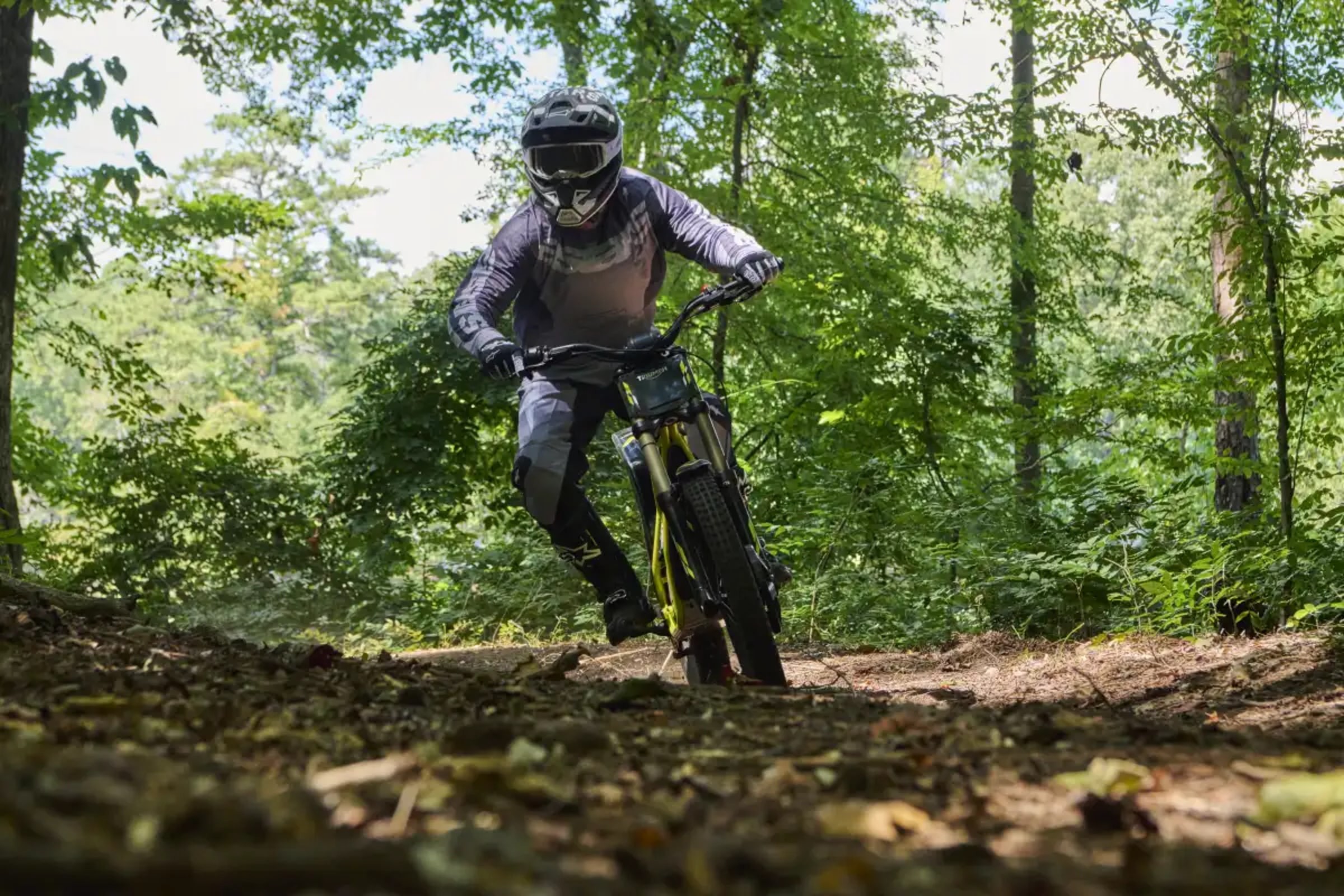 Triumph TXP-24 trials lean on rocky terrain