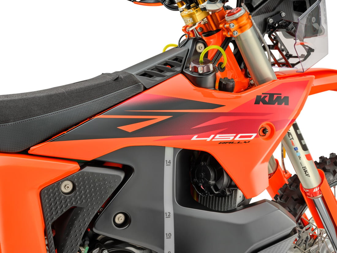 2027 KTM 450 Rally Replica front tank detail with liter sight gauge and Scotts damper