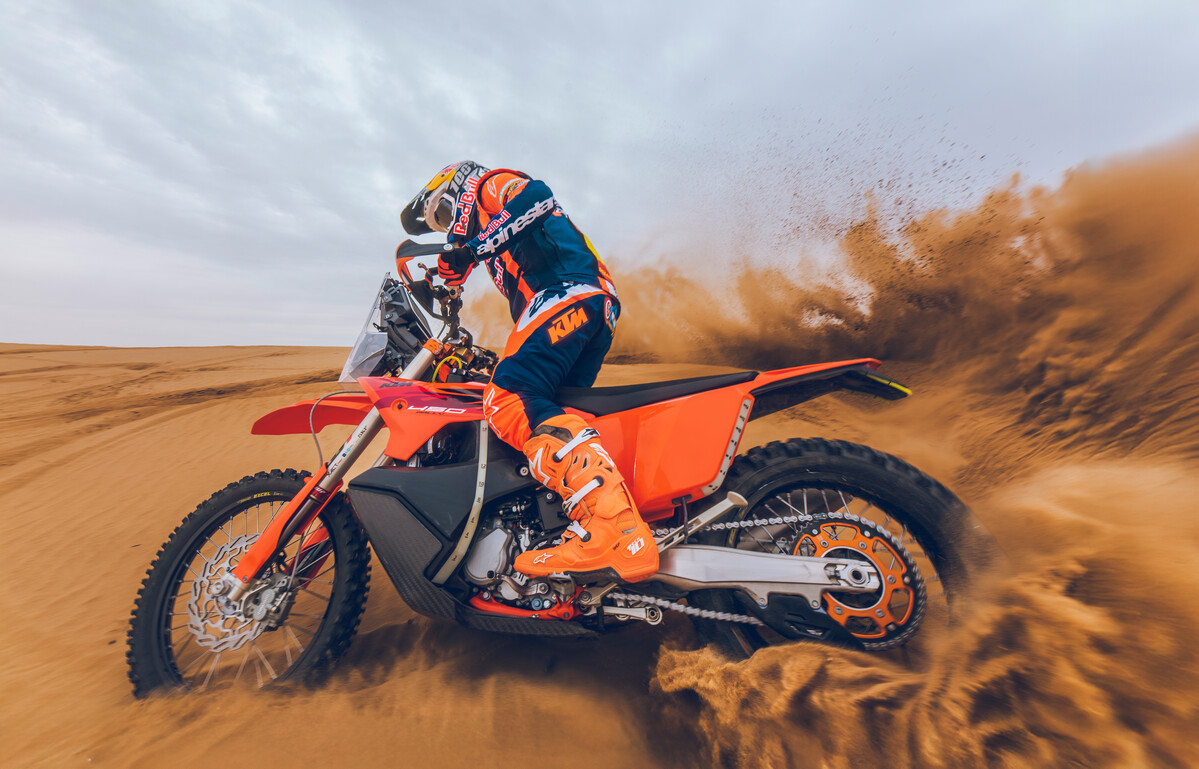 2027 KTM 450 Rally Replica low side angle carving desert sand