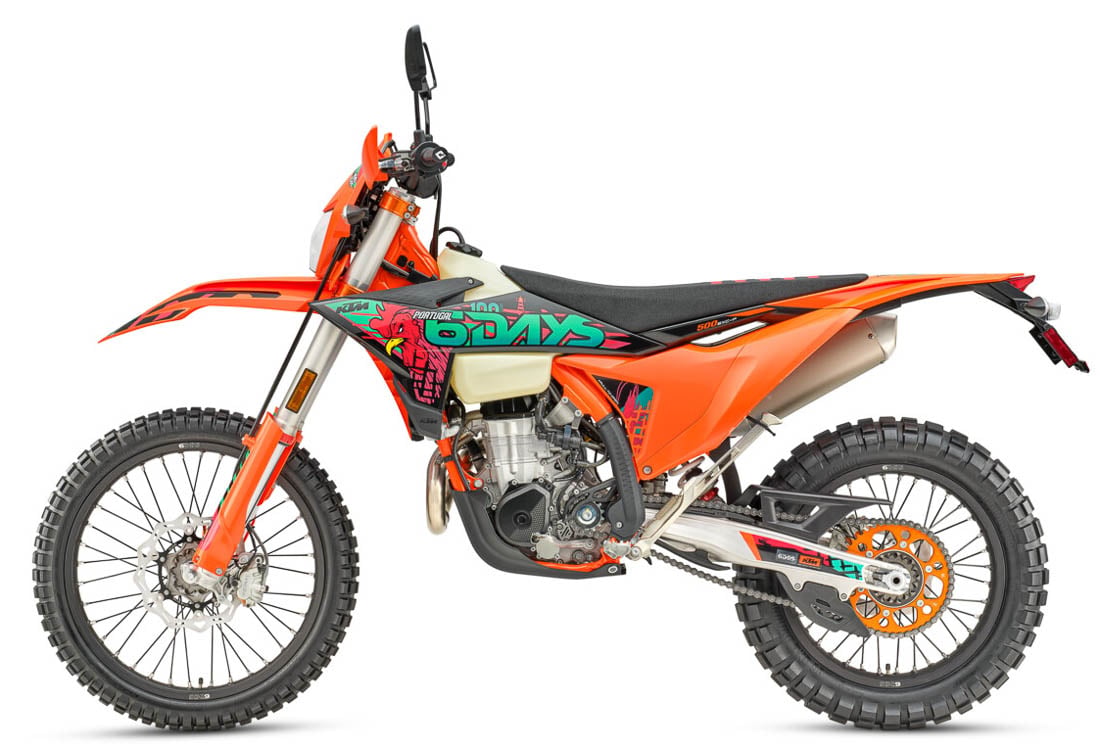 2027 KTM 500 EXC-F 6Days left-side studio — orange frame, 6Days / Portugal rooster graphics, orange sprocket
