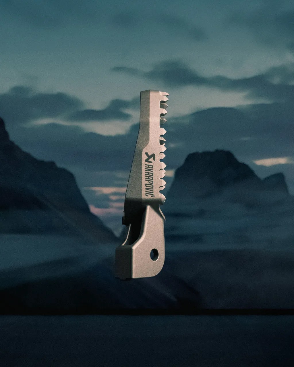 Akrapovič titanium footpeg rotation studio angle 4