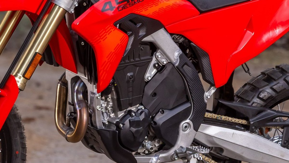 Engine side cases, header pipe and frame of a Ducati Desmo450 EDS dual-sport