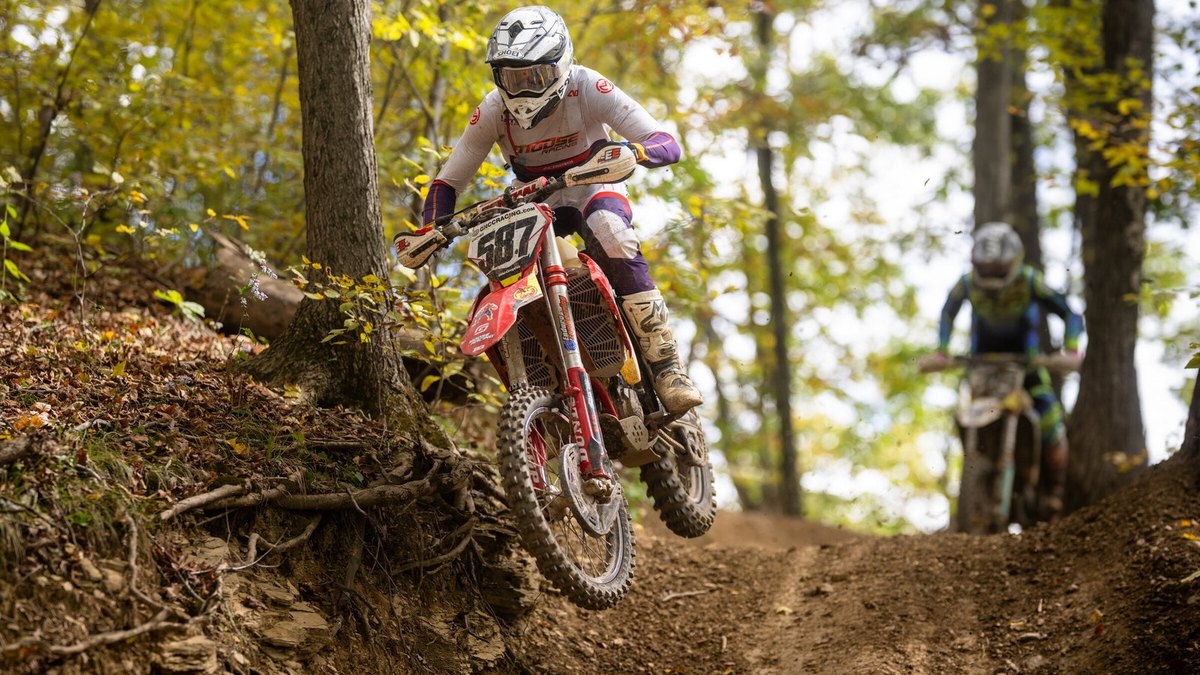 Bike racer on a woods trail at the 2025 John Penton GNCC, Sunday Creek Raceway, Millfield, Ohio