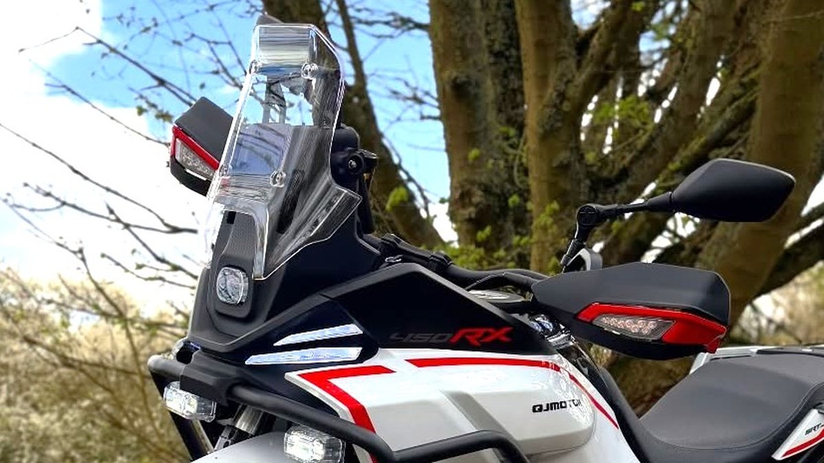 Black and red wraparound handguards with integrated turn signals on ADV bars